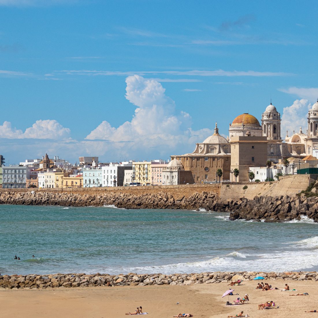 Sealine way in the beach of the city centre of Cadiz with its with and yellow buildings include it in the tour.