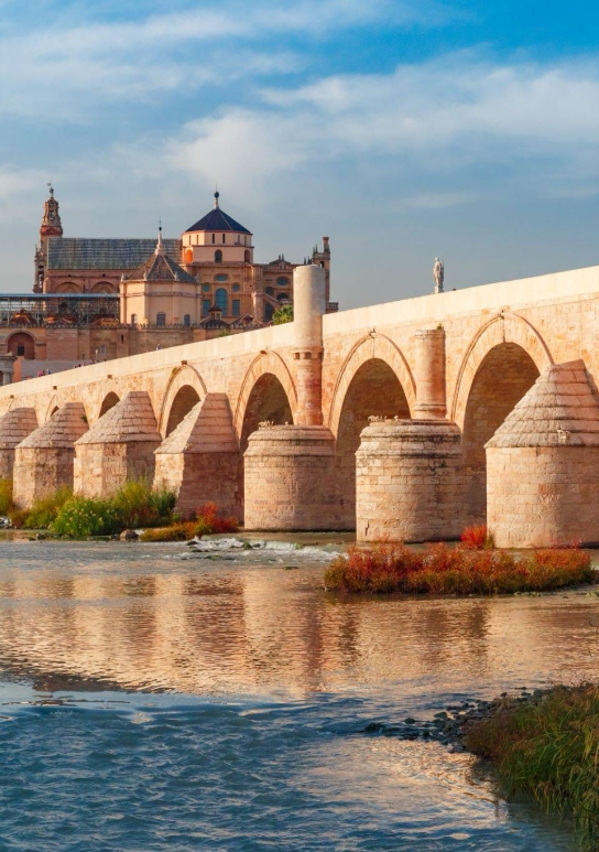 Roman bridge of Cordoba with views of the old city and its sky clear of spring days.