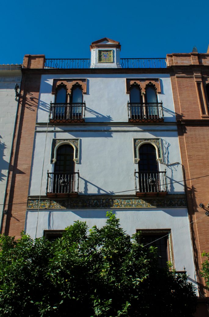 Facade of traditional architecture in the city of Seville.