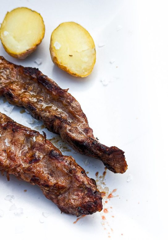 One tapa dish with 2 filets of tasty iberian meat and potatoes that would make you melt.