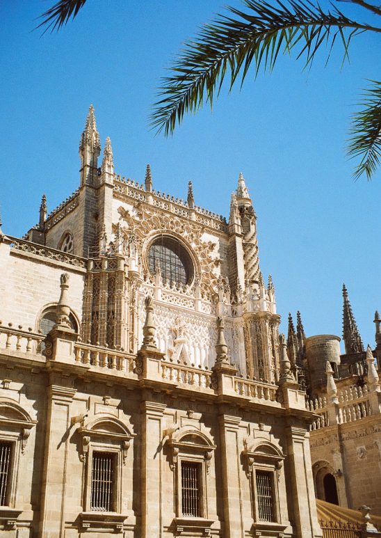 One of the incredible facades of the Cathedral of Seville with its unmistakable Gothic style.